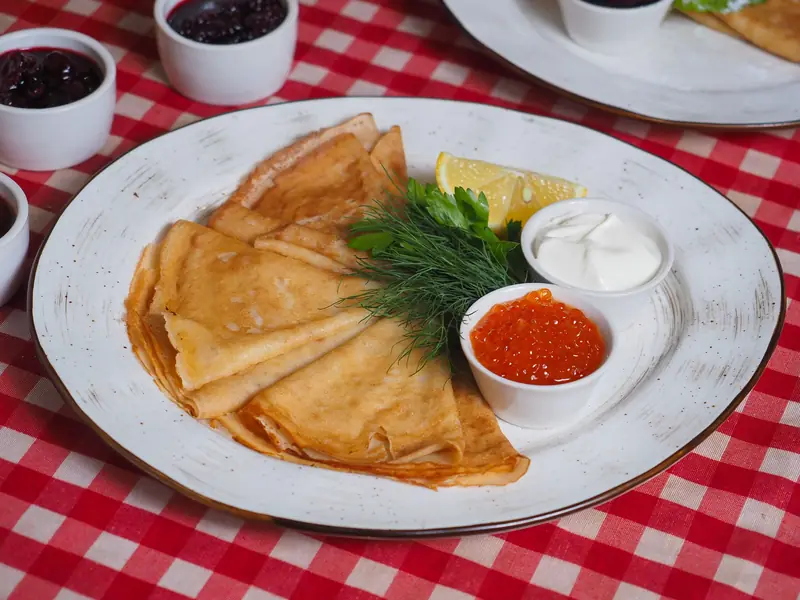 Blini with caviar and sour cream
