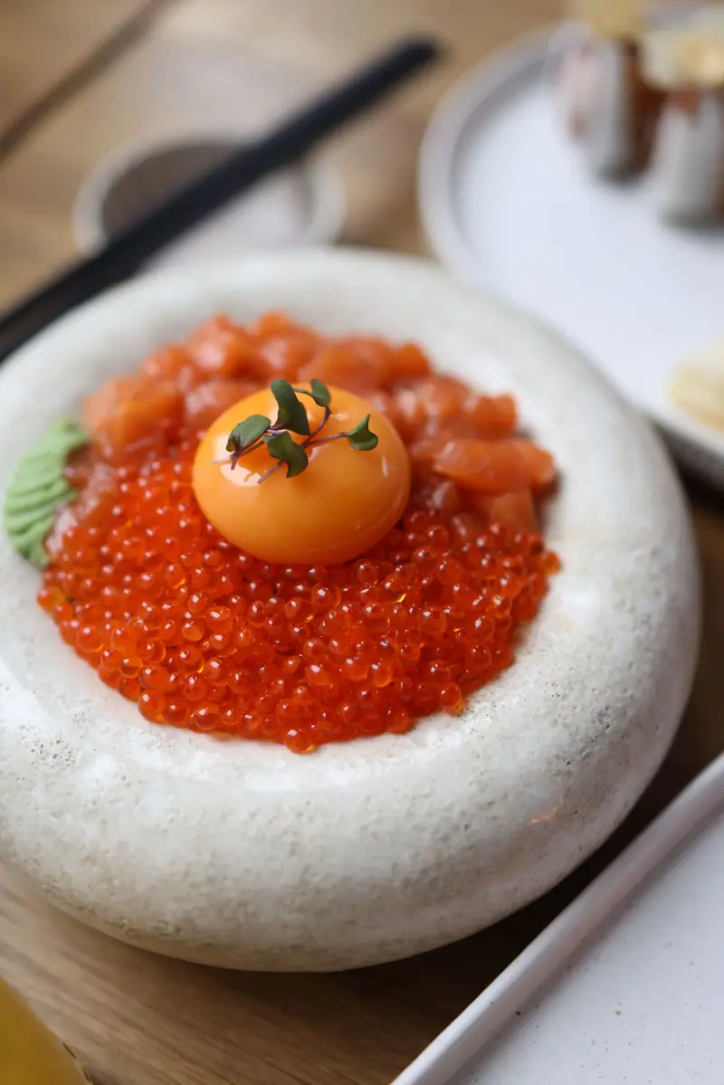 Salmon roe on a stone plate