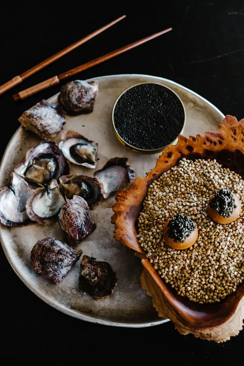 A seafood platter with caviar and oysters